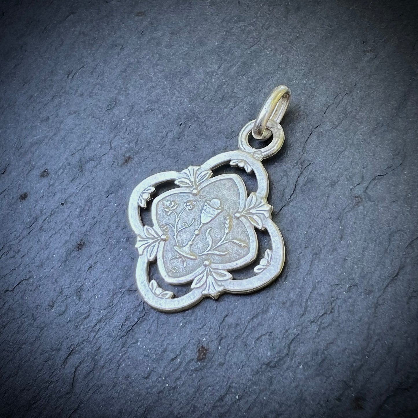 Médaille de communion quadrilobée en argent