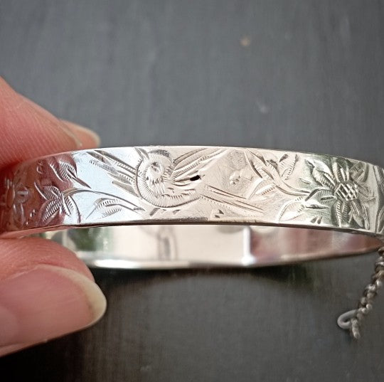 Bracelet enfant oiseau et fleurs ciselés en argent