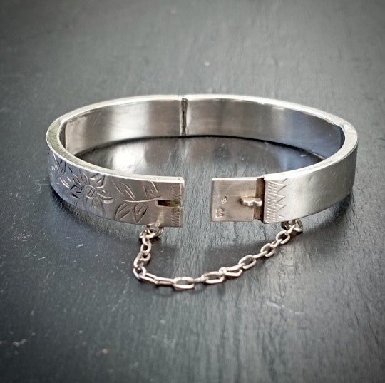 Bracelet enfant oiseau et fleurs ciselés en argent