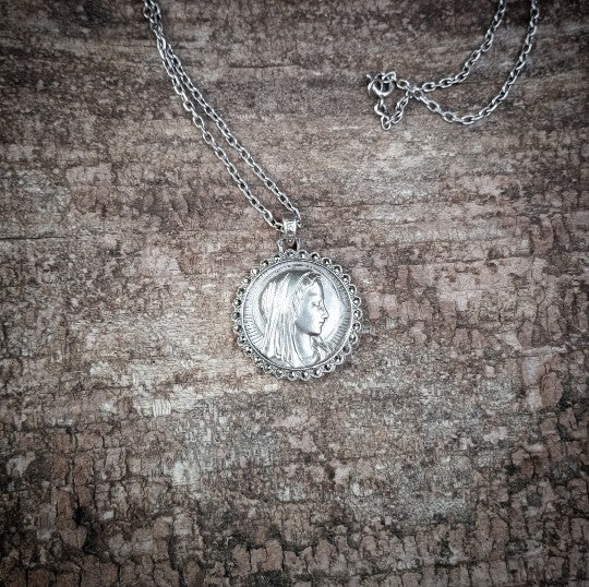 Medal of the Virgin Mary in silver set with marcasites and old chain