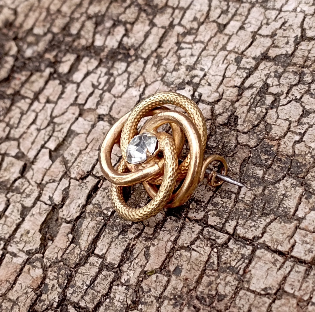 Broche spirale serpent en laiton et strass