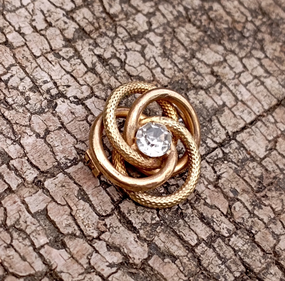 Broche spirale serpent en laiton et strass