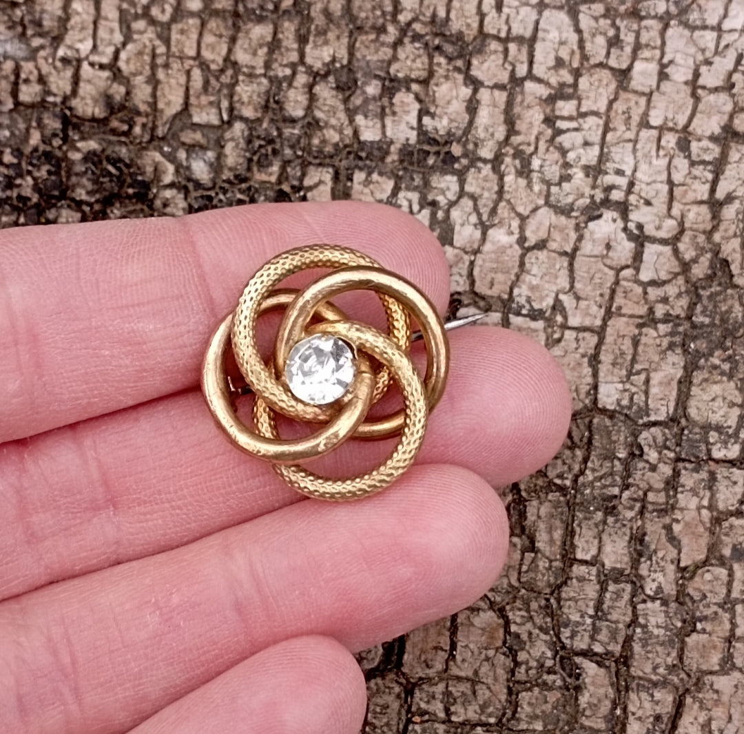 Broche spirale serpent en laiton et strass