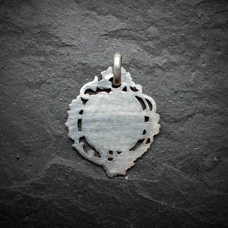 Médaille ancienne de 1ere communion en argent et vermeil